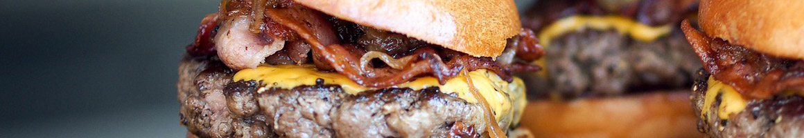 Eating American (Traditional) Burger at Soda Shop restaurant in Davidson, NC.